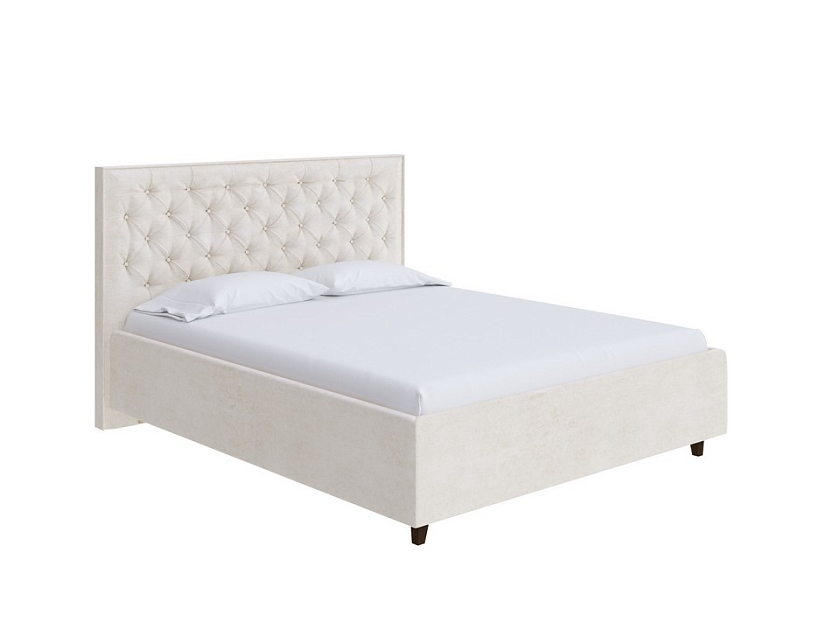 Кровать Teona Grand 160x200 Ткань: Микрофибра Diva Латте - Кровать с увеличенным изголовьем, украшенным благородной каретной пиковкой.